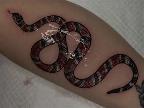 gucci snake wrist tattoo|gucci snake tattoo meaning.